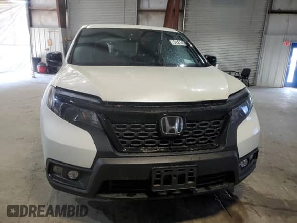 2020 Honda Passport EX-L with VIN 5FNYF8H51LB003575, listed as a Copart auction lot 54214965 with 61,791 mi miles and Salvage title. Bid and sale history available at DreamBid. Image 5.
