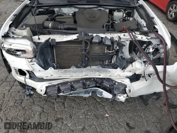 2016 Toyota Tacoma SR z VIN 3TMCZ5AN5GM020956, wystawiony jako Copart lot #80021725 z przebiegiem 106 368 mil mil oraz Szkoda całkowita • Salvage title. Historia ofert i sprzedaży dostępna na DreamBid. Obrazek 11.