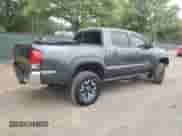 2016 Toyota Tacoma SR with VIN 3TMCZ5AN7GM034244, listed as a Copart auction lot 69387695 with 60,023 mi miles and Salvage title. Bid and sale history available at DreamBid. Image 3.