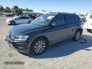 2018 Volkswagen Tiguan S с VIN 3VV1B7AX7JM108666, выставлен на аукционе Copart как лот 80034905 с пробегом 109 757 миль миль и Списание • Salvage title. История ставок и продаж доступна на DreamBid. Изображение 1.