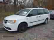 2014 Dodge Grand Caravan SE with VIN 2C4RDGBG6ER458881, listed as a IAAI auction lot 43574110 with 189,082 mi miles and . Bid and sale history available at DreamBid. Image 2.