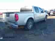 2013 Nissan Frontier SV z VIN 1N6AD0EV9DN711487, wystawiony jako IAAI lot #41225953 z przebiegiem 146 722 mil mil oraz . Historia ofert i sprzedaży dostępna na DreamBid. Obrazek 4.