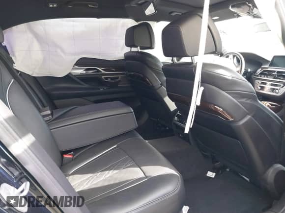 2021 BMW 7 Series 740i z VIN WBA7T2C03MCF58569, wystawiony jako IAAI lot #41662350 z przebiegiem 41 303 mil mil oraz . Historia ofert i sprzedaży dostępna na DreamBid. Obrazek 8.