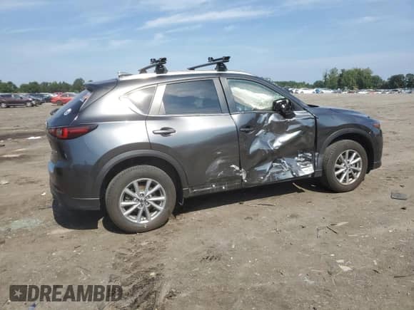 2023 Mazda CX-5 S Select with VIN JM3KFBBM4P0271602, listed as a Copart auction lot 66711345 with 21,328 mi miles and Salvage title. Bid and sale history available at DreamBid. Image 3.