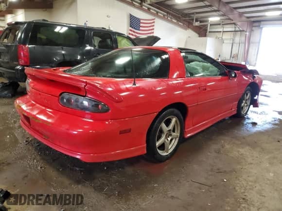 1999 Chevrolet Camaro z VIN 2G1FP22K2X2130055, wystawiony jako Copart lot #81698164 z przebiegiem Nie podano mil oraz Czysty tytuł • Clean title. Historia ofert i sprzedaży dostępna na DreamBid. Obrazek 3.