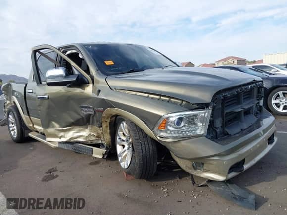2014 Ram 1500 Longhorn z VIN 1C6RR7PT4ES476647, wystawiony jako IAAI lot #41883104 z przebiegiem 84 728 mil mil oraz . Historia ofert i sprzedaży dostępna na DreamBid. Obrazek 6.