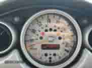 2004 MINI Hardtop with VIN WMWRC33454TJ56308, listed as a Copart auction lot 59690865 with 99,374 mi miles and Salvage title. Bid and sale history available at DreamBid. Image 9.