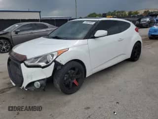2017 Hyundai Veloster Value Edition с VIN KMHTC6ADXHU323819, выставлен на аукционе Copart как лот 69654695 с пробегом 115 450 миль миль и Списание • Salvage title. История ставок и продаж доступна на DreamBid. Изображение 1.
