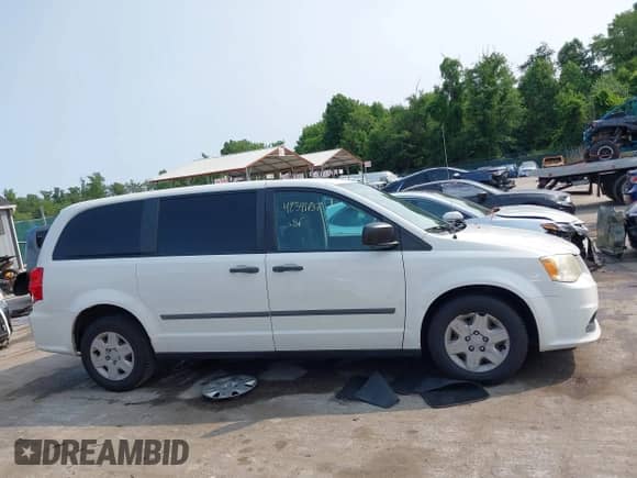2011 Dodge Grand Caravan with VIN 2D4JN1AG3BR789019, listed as a IAAI auction lot 42391737 with 128,136 mi miles and . Bid and sale history available at DreamBid. Image 13.