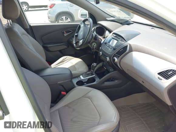 2014 Hyundai Tucson Limited z VIN KM8JUCAG3EU906614, wystawiony jako IAAI lot #42578113 z przebiegiem 84 512 mil mil oraz . Historia ofert i sprzedaży dostępna na DreamBid. Obrazek 5.