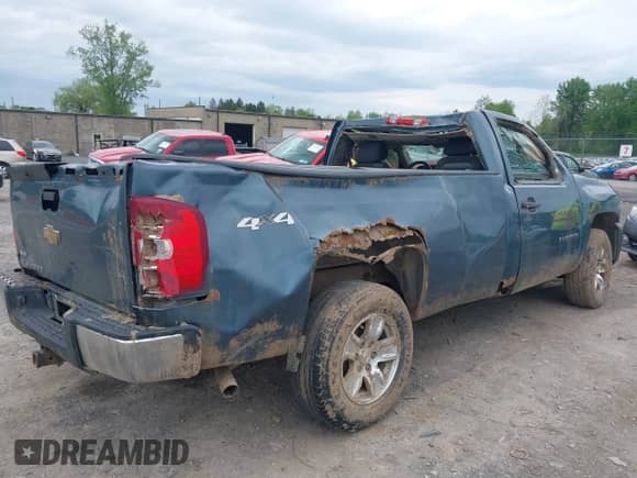 2011 Chevrolet Silverado 1500 Work Truck with VIN 1GCNKPE00BZ461618, listed as a IAAI auction lot 42307902 with 130,511 mi miles and . Bid and sale history available at DreamBid. Image 4.