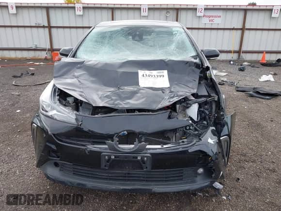 2022 Toyota Prius LE with VIN JTDKAMFU3N3187036, listed as a IAAI auction lot 43493399 with 98,731 mi miles and . Bid and sale history available at DreamBid. Image 13.