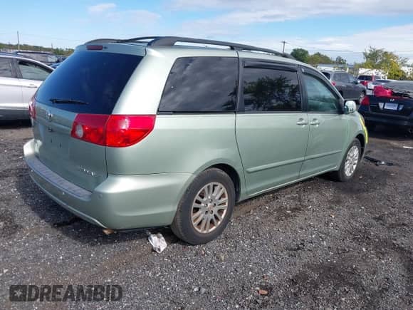 2009 Toyota Sienna XLE with VIN 5TDZK22C39S264912, listed as a IAAI auction lot 43385734 with 327,786 mi miles and . Bid and sale history available at DreamBid. Image 4.