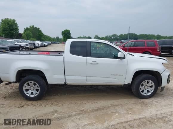 2021 Chevrolet Colorado 2WD LT z VIN 1GCHSCEA8M1205131, wystawiony jako IAAI lot #42273672 z przebiegiem 84 711 mil mil oraz . Historia ofert i sprzedaży dostępna na DreamBid. Obrazek 14.