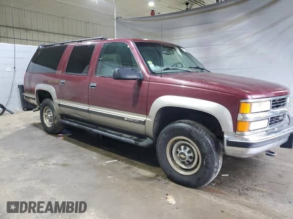 1999 Chevrolet Suburban с VIN 1GNGK26JXXJ480516, выставлен на аукционе Copart как лот 81368595 с пробегом 157 625 миль миль и Чистый • Clean title. История ставок и продаж доступна на DreamBid. Изображение 4.