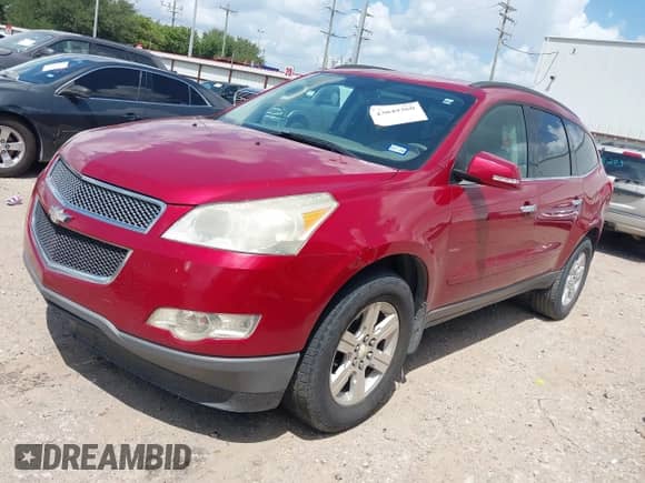 2012 Chevrolet Traverse 1LT z VIN 1GNKRGED8CJ374347, wystawiony jako IAAI lot #43049360 z przebiegiem Nie podano mil oraz . Historia ofert i sprzedaży dostępna na DreamBid. Obrazek 2.