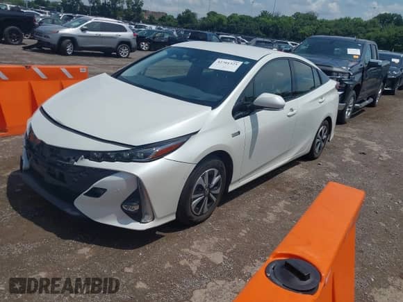 2018 Toyota Prius Plus z VIN JTDKARFP5J3070415, wystawiony jako IAAI lot #42701325 z przebiegiem 77 529 mil mil oraz . Historia ofert i sprzedaży dostępna na DreamBid. Obrazek 2.