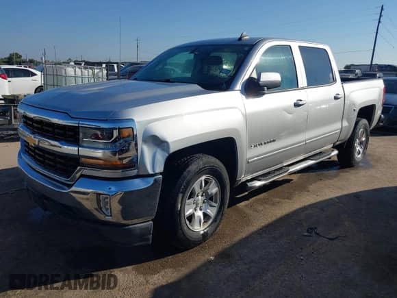 2017 Chevrolet Silverado 1500 LT with VIN 3GCPCREH8HG409895, listed as a IAAI auction lot 43413279 with 127,528 mi miles and . Bid and sale history available at DreamBid. Image 2.