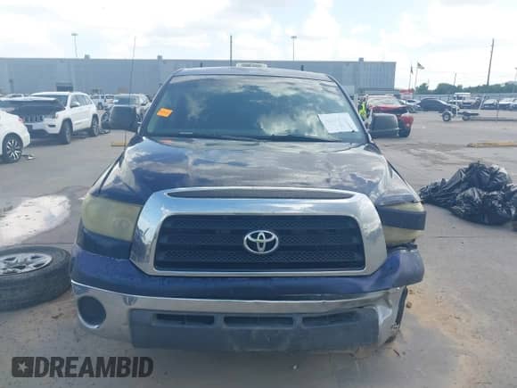 2007 Toyota Tundra SR5 z VIN 5TBET54107S454598, wystawiony jako IAAI lot #42558681 z przebiegiem 309 838 mil mil oraz . Historia ofert i sprzedaży dostępna na DreamBid. Obrazek 13.