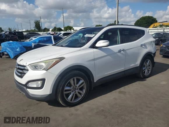 2015 Hyundai Santa Fe с VIN 5XYZW4LA6FG255949, выставлен на аукционе Copart как лот 66069585 с пробегом 113 324 миль миль и Списание • Salvage title. История ставок и продаж доступна на DreamBid. Изображение 1.