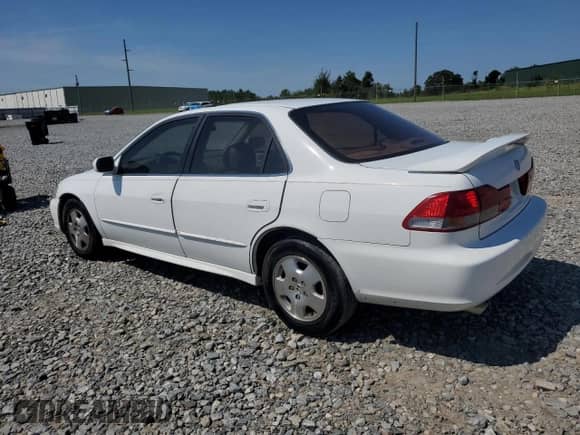 2001 Honda Accord EX z VIN 1HGCG16561A061805, wystawiony jako Copart lot #70577215 z przebiegiem 233 090 mil mil oraz Szkoda całkowita • Salvage title. Historia ofert i sprzedaży dostępna na DreamBid. Obrazek 2.
