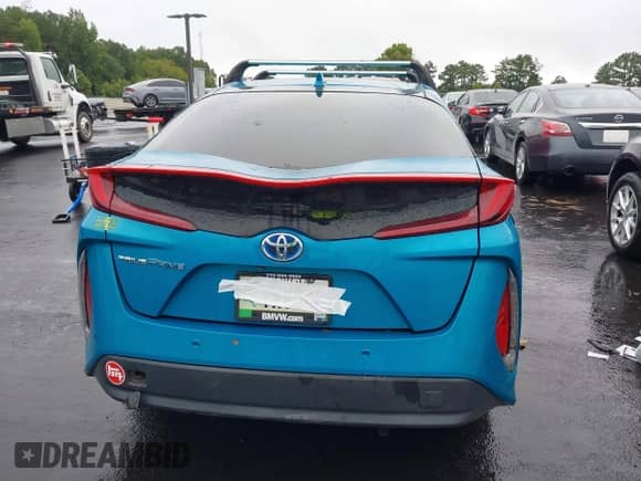 2018 Toyota Prius Plus z VIN JTDKARFP7J3070223, wystawiony jako IAAI lot #42922283 z przebiegiem 65 134 mil mil oraz . Historia ofert i sprzedaży dostępna na DreamBid. Obrazek 16.
