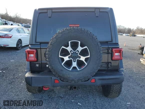 2020 Jeep Wrangler Rubicon with VIN 1C4HJXCG0LW194810, listed as a Copart auction lot 87317364 with 49,836 mi miles and Salvage title. Bid and sale history available at DreamBid. Image 6.