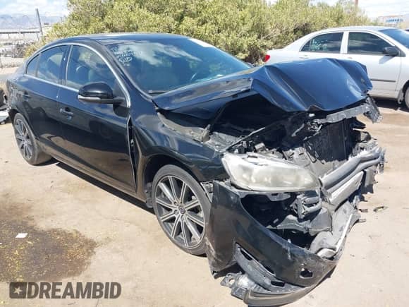 2015 Volvo S60 T5 Drive-E Premier with VIN YV140MFB3F2299721, listed as a IAAI auction lot 42013732 with 82,407 mi miles and . Bid and sale history available at DreamBid. Image 1.