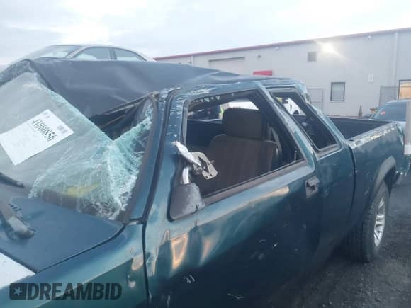 1993 Dodge Dakota z VIN 1B7GG23X7PS200435, wystawiony jako IAAI lot #41060856 z przebiegiem 249 117 mil mil oraz . Historia ofert i sprzedaży dostępna na DreamBid. Obrazek 6.