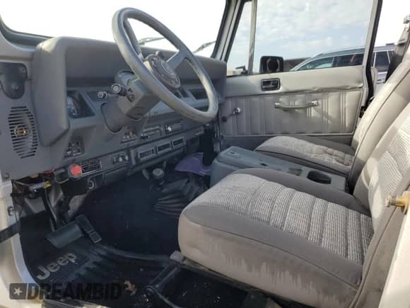 1989 Jeep Wrangler с VIN 2J4FY59T7KJ137127, выставлен на аукционе Copart как лот 85524344 с пробегом 150 929 миль миль и Чистый • Clean title. История ставок и продаж доступна на DreamBid. Изображение 7.