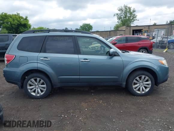 2012 Subaru Forester X Limited z VIN JF2SHAEC9CH402424, wystawiony jako IAAI lot #42526799 z przebiegiem 97 424 mil mil oraz . Historia ofert i sprzedaży dostępna na DreamBid. Obrazek 14.