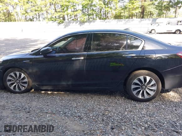 2017 Honda Accord Touring with VIN JHMCR6F78HC018457, listed as a IAAI auction lot 43080667 with 129,726 mi miles and . Bid and sale history available at DreamBid. Image 14.