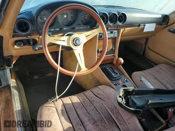 1983 Mercedes-Benz SL с VIN WDB10704612002765, выставлен на аукционе Copart как лот 75185334 с пробегом 72 315 миль миль и На запчасти • Non repairable. История ставок и продаж доступна на DreamBid. Изображение 8.