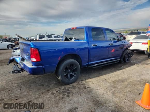 2015 Ram 1500 Express with VIN 3C6RR7KT0FG699509, listed as a Copart auction lot 81430545 with 54,797 mi miles and Salvage title. Bid and sale history available at DreamBid. Image 3.