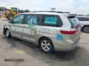2015 Toyota Sienna LE AAS with VIN 5TDKK3DC5FS568890, listed as a IAAI auction lot 43300989 with 243,285 mi miles and . Bid and sale history available at DreamBid. Image 3.