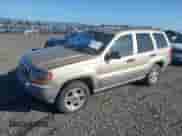 2000 Jeep Grand Cherokee Laredo z VIN 1J4GW48S0YC309210, wystawiony jako IAAI lot #43551821 z przebiegiem 324 070 mil mil oraz . Historia ofert i sprzedaży dostępna na DreamBid. Obrazek 2.