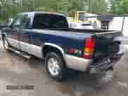 2005 GMC Sierra 1500 SLE with VIN 1GTEK19B25Z157848, listed as a IAAI auction lot 42333667 with 302,758 mi miles and . Bid and sale history available at DreamBid. Image 3.