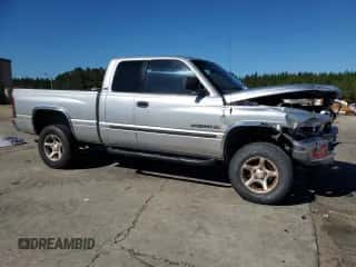2001 Dodge 1500 z VIN 3B7HF13ZX1G728018, wystawiony jako Copart lot #86523065 z przebiegiem 159 194 mil mil oraz Szkoda całkowita • Salvage title. Historia ofert i sprzedaży dostępna na DreamBid. Obrazek 4.