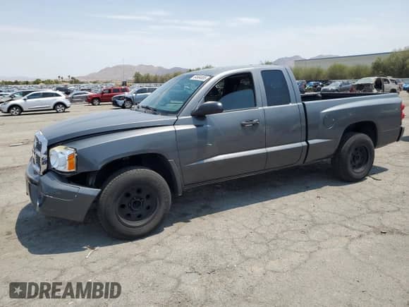 2007 Dodge Dakota SLT with VIN 1D7HE42K27S255960, listed as a Copart auction lot 64684855 with 170,299 mi miles and Salvage title. Bid and sale history available at DreamBid. Image 1.