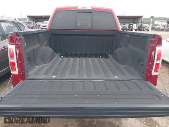 2013 Ford F-150 Lariat with VIN 1FTFW1ET0DKG07088, listed as a IAAI auction lot 42671190 with 202,968 mi miles and . Bid and sale history available at DreamBid. Image 17.