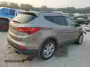 2014 Hyundai Santa Fe с VIN 5XYZUDLA8EG202755, выставлен на аукционе Copart как лот 67065515 с пробегом 125 235 миль миль и Списание • Salvage title. История ставок и продаж доступна на DreamBid. Изображение 3.
