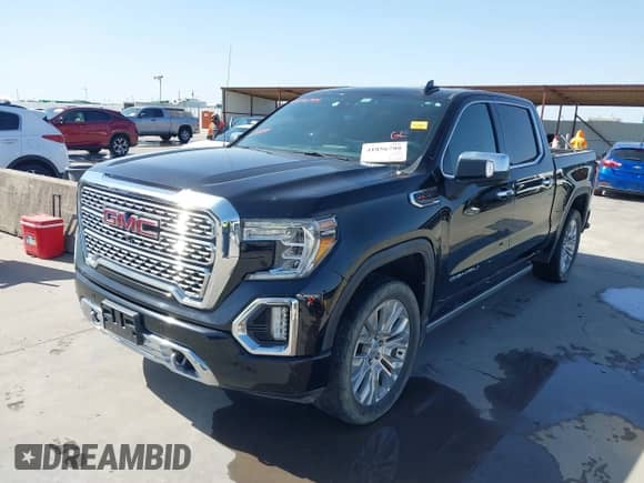 2020 GMC Sierra 1500 Denali with VIN 1GTU9FEL6LZ173499, listed as a IAAI auction lot 41856799 with 77,723 mi miles and . Bid and sale history available at DreamBid. Image 2.