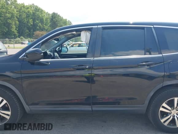 2016 Honda Pilot EX-L with VIN 5FNYF6H65GB023069, listed as a IAAI auction lot 42791699 with 154,991 mi miles and . Bid and sale history available at DreamBid. Image 15.