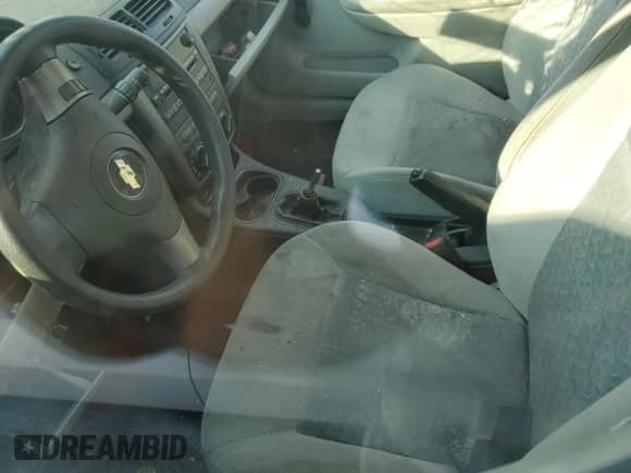 2007 Chevrolet Cobalt LS с VIN 1G1AK15F477293591, выставлен на аукционе Copart как лот 62274455 с пробегом Не указан миль и Списание • Salvage title. История ставок и продаж доступна на DreamBid. Изображение 7.