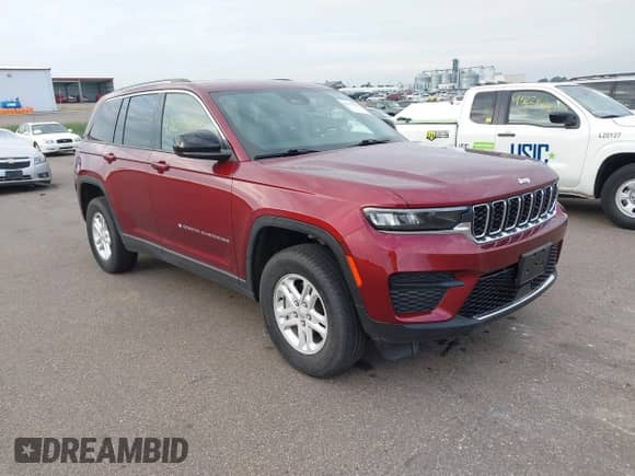 2023 Jeep Grand Cherokee Laredo with VIN 1C4RJHAG7PC543255, listed as a IAAI auction lot 43253108 with 26,873 mi miles and . Bid and sale history available at DreamBid. Image 1.