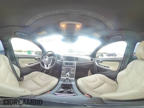 2015 Volvo S60 T5 Drive-E Platinum с VIN YV140MFM0F2355504, выставлен на аукционе Copart как лот 60310125 с пробегом 93 375 миль миль и Списание • Salvage title. История ставок и продаж доступна на DreamBid. Изображение 14.