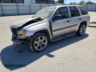 2005 Chevrolet TrailBlazer LS с VIN 1GNDS13S552166404, выставлен на аукционе Copart как лот 68383055 с пробегом 191 128 миль миль и Списание • Salvage title. История ставок и продаж доступна на DreamBid. Изображение 1.
