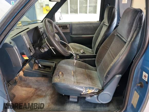1990 Chevrolet Blazer with VIN 1GNCT18Z2L0107091, listed as a Copart auction lot 80714795 with 203,095 mi miles and Salvage title. Bid and sale history available at DreamBid. Image 7.