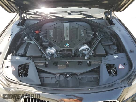 2012 BMW 7 Series 750i xDrive with VIN WBAKC6C53CC395771, listed as a Copart auction lot 58815745 with 106,237 mi miles and Salvage title. Bid and sale history available at DreamBid. Image 11.