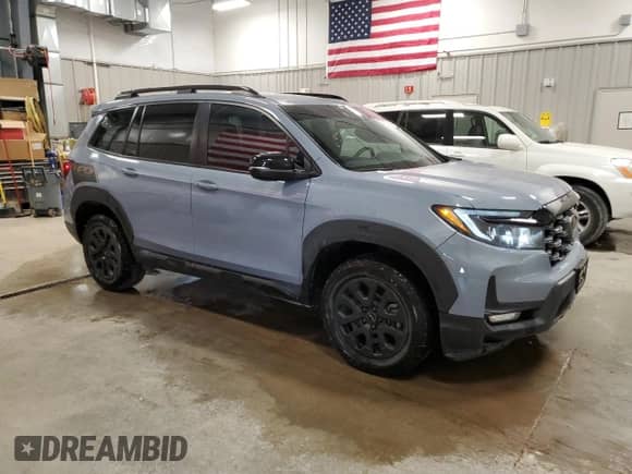 2022 Honda Passport TrailSport with VIN 5FNYF8H61NB028777, listed as a Copart auction lot 65237305 with 34,105 mi miles and Salvage title. Bid and sale history available at DreamBid. Image 4.